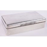 A rectangular silver cigarette box, by Mappin & Webb, London 1917, length 17.5cm.