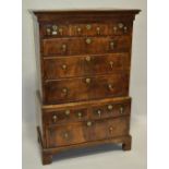 An 18th century walnut chest on chest,