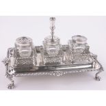 A George III cast silver desk stand, with cast gadrooned edge,