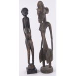 2 African tribal carved wood figures, largest height 26".