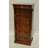 A Victorian figured walnut secretaire Wellington chest, having 2 drawers,