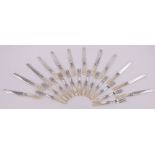 A set of Victorian mother of pearl and silver plate dessert knives and forks for 12 people.