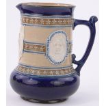 A Doulton Lambeth jug commemorating the Chicago Exhibition, height 7.5".