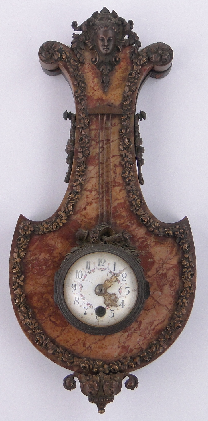 A 19th century French ormolu and marble cased wall hanging lyre shaped clock,