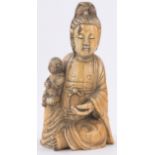 A Chinese carved ivory seated Buddha and child, 18th/19th century, height 15cm.
