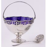 A silver swing handled sugar basket,