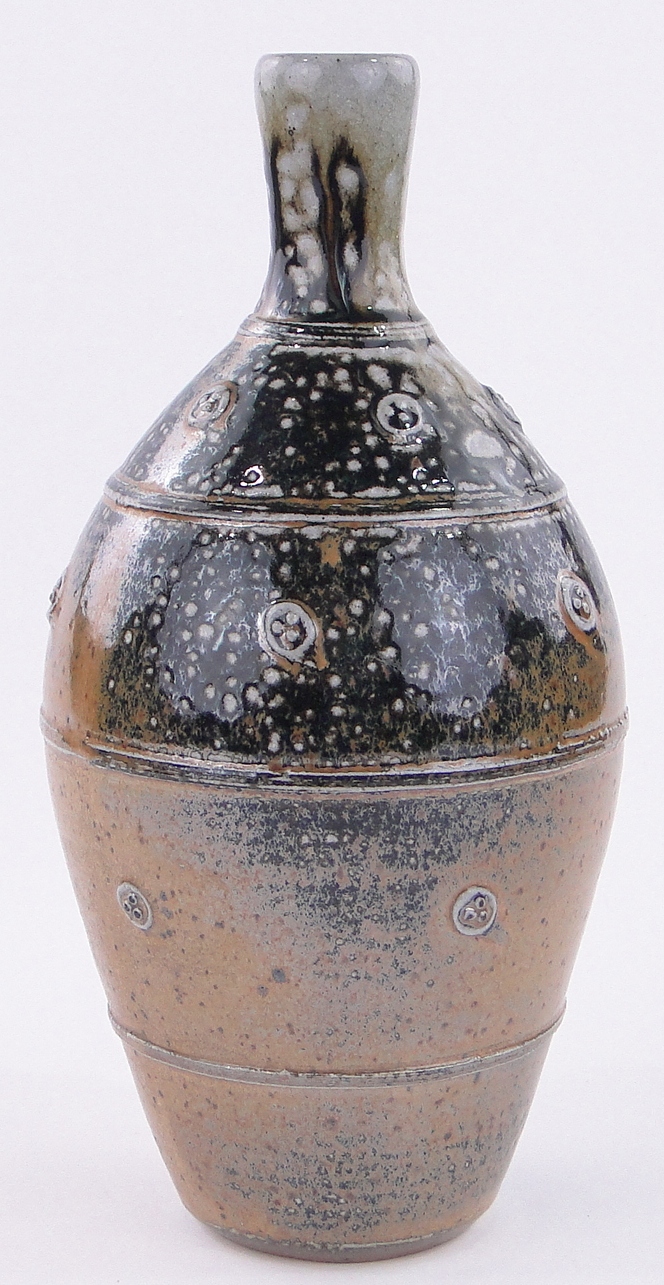 John Jeles, a contemporary Studio Pottery narrow necked vase, ash glazed with raised bosses,