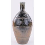 John Jeles, a contemporary Studio Pottery narrow necked vase, ash glazed with raised bosses,
