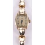 A lady's 9ct gold Tudor Royal wristwatch, with 9ct gold strap, case width 15mm.