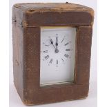 A French brass cased carriage clock, case height 11cm original leather travelling case.