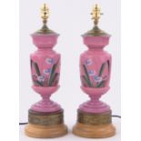 Pair of Victorian pink glass table lamps,