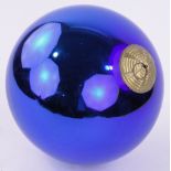 A large blue glass witches ball, diameter 24cm.