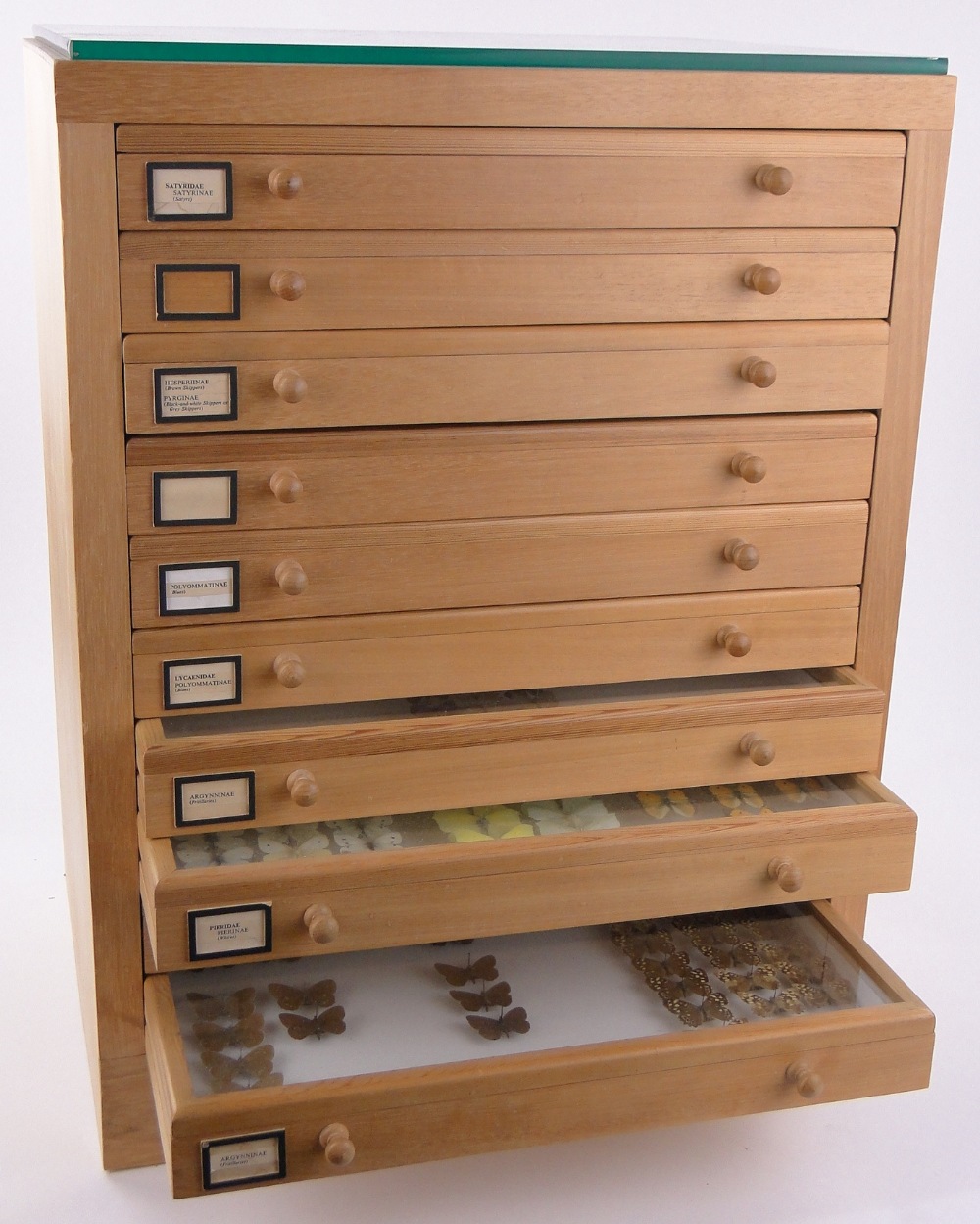 A 10-drawer butterfly collector's cabinet, with glass topped drawers,