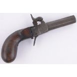 An 18th century percussion overcoat pistol, length overall 17cm.