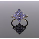 A 9ct gold tanzanite cluster ring, size P.