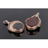 2 Victorian stone set gold swivel fobs.