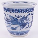 A large Chinese blue and white porcelain jardiniere, with painted dragon designs, height 32cm,