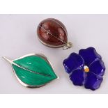 A sterling silver and green enamel leaf shaped brooch,