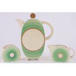 A Clarice Cliff 3-piece teaset, with painted geometric design, teapot height 20cm.