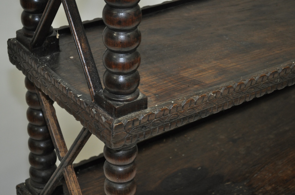 An Antique rosewood 3-tier stand, with carved edge, cross pierce sides and bobbin turned supports, - Image 3 of 6