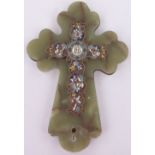 A gilt metal and champleve enamel cross on onyx plaque, height 25cm.