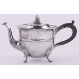 An Edwardian Irish silver teapot, with lion mask feet, makers marks T W Dublin 1909, 21 oz.