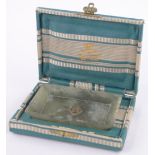 A small Oriental rectangular jade dish, with flared sides and bracket feet, length 8.3cm, height 1.