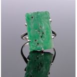 A Chinese carved and pierced jade panel ring circa 1920, indistinct marks tests as white gold,