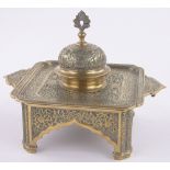 An ornate Middle Eastern brass ink stand,