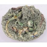 A Portuguese Palissy style glazed ceramic dish, with lizards, frogs and worms, diameter 28cm.