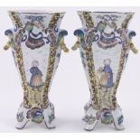 A pair of French tin glazed faience 2-handled vases, with painted continental figures, height 26cm.