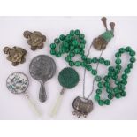 A group of Oriental items, including green hardstone beads, pair of bronze ornamental beasts,