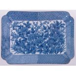 An Oriental blue and white porcelain rectangular dish, with painted floral panel, signed under base,