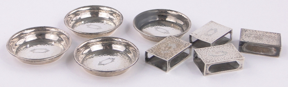 A set of 4 sterling silver matchbox holders and dishes, diameter 6.5cm.