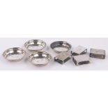 A set of 4 sterling silver matchbox holders and dishes, diameter 6.5cm.