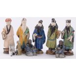 A group of Oriental glazed pottery figures circa 1900, largest height 20cm.