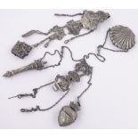 2 19th century unmarked continental silver chatelaines, mounted with sewing items,