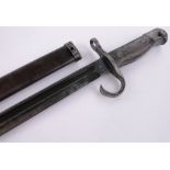 A Japanese 1897 pattern sword bayonet, blade length 39.5cm, original metal scabbard.