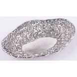 A Victorian oval silver bowl, with relief floral decoration, makers marks E F H T London 1890,