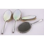 A 4-piece silver and opalescent enamel backed brush and mirror set, Birmingham 1939.