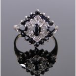 A 9ct gold sapphire and diamond cluster ring, setting height 15mm, size O.