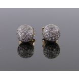 Pair of 9ct gold diamond set domed earstuds, 6mm across.