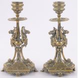 Pair of Victorian cast brass candlesticks, with Griffon supports, height 19cm.
