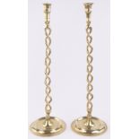 Pair of tall brass open twist candlesticks, height 51cm.