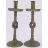 Pair of Victorian Gothic brass candlesticks, height 26cm.