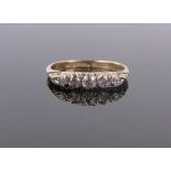 An 18ct gold 5 stone diamond ring, size O.