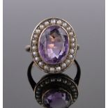 An unmarked gold amethyst and pearl cluster ring, setting height 19mm, size N.