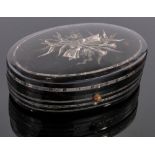 A 19th century oval tortoiseshell and silver inlaid snuff box, length 9cm.