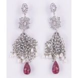 A very large and ornate pair of 18ct white gold ruby, diamond and pearl set drop earrings,