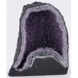 A natural amethyst geode cavern, height 33cm, width 26cm.